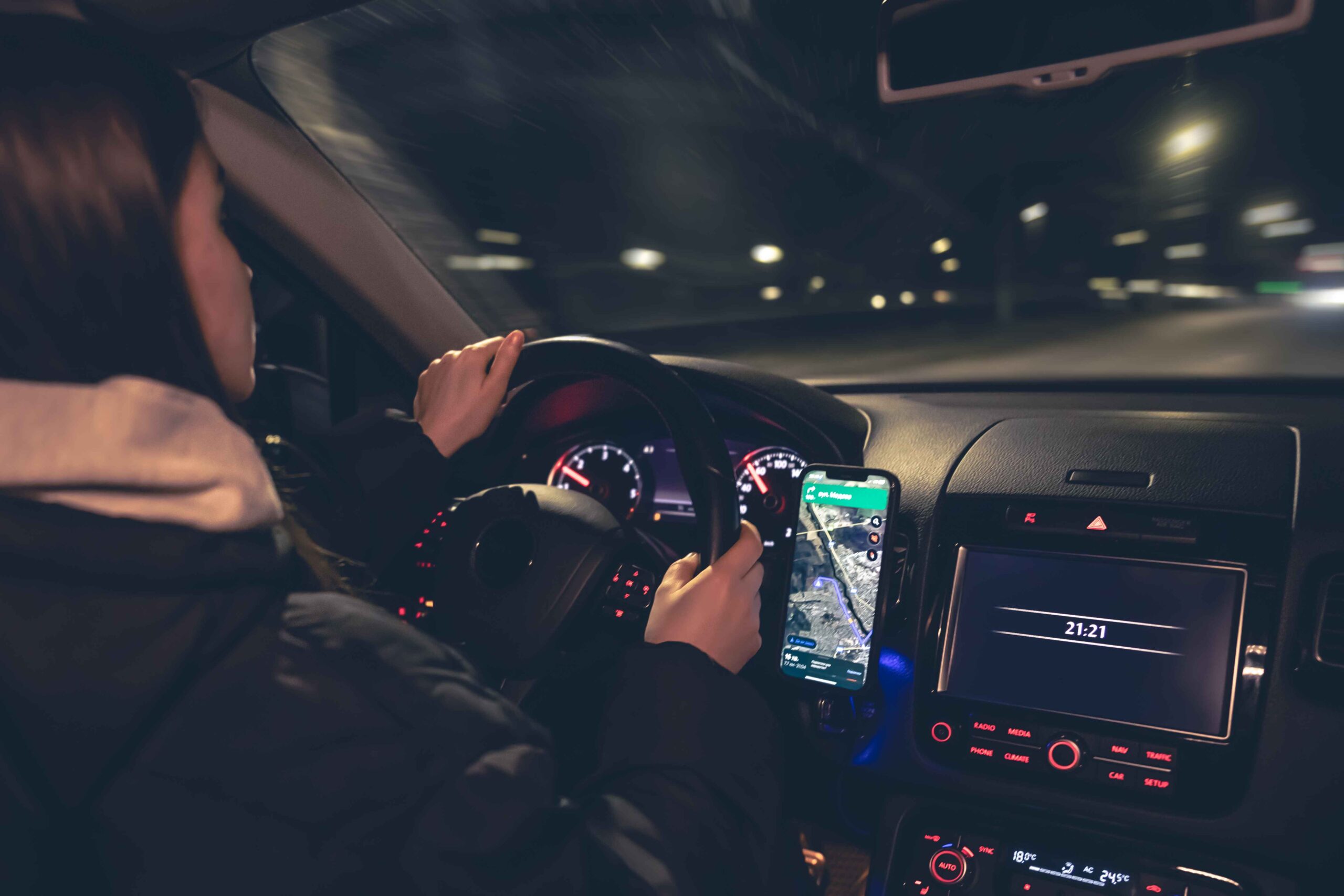 driving-car-night-woman-driving-her-modern-car-night-city_11zon